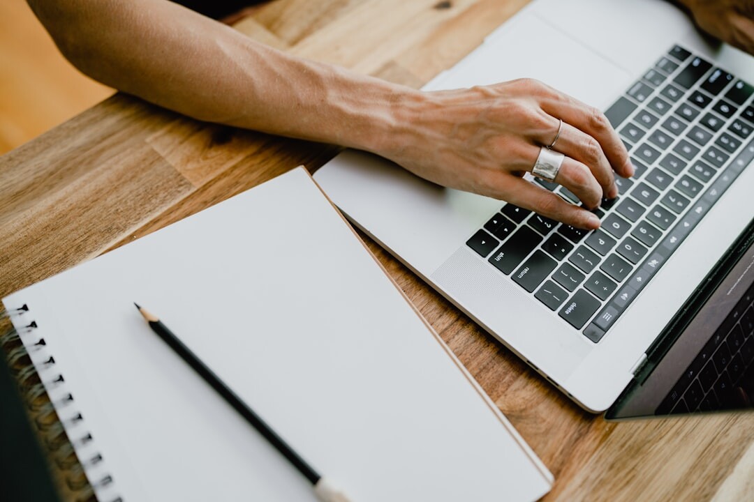 mystery writer at laptop